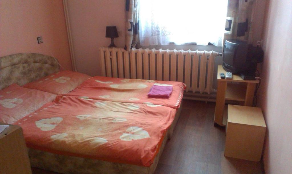 Postel nebo postele na pokoji v ubytování Pension Doctor