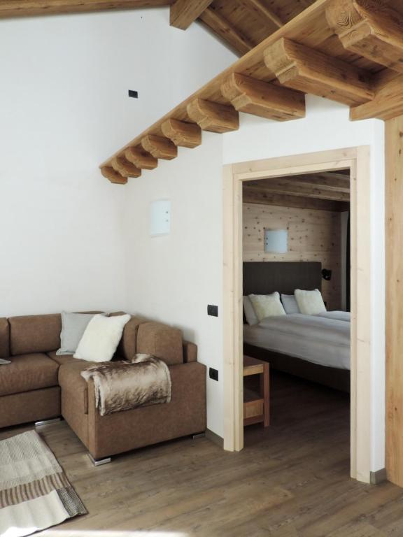 Posteľ alebo postele v izbe v ubytovaní Tilio Chalet