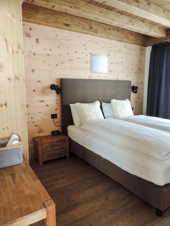 Posteľ alebo postele v izbe v ubytovaní Tilio Chalet