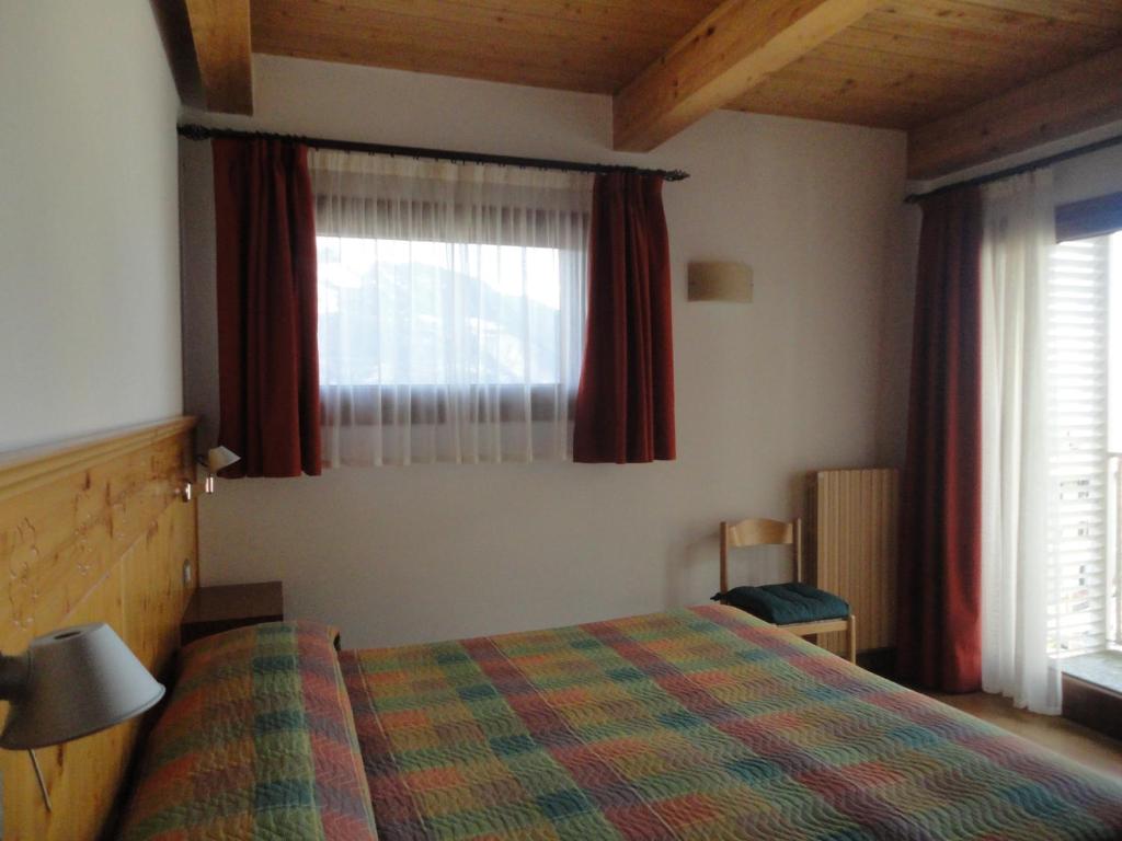 Postel nebo postele na pokoji v ubytování Albergo Ristorante Baraglia