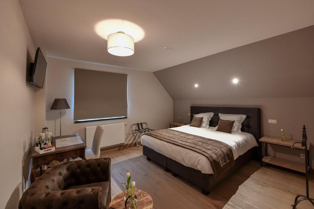 Postel nebo postele na pokoji v ubytování B&B De Waeterhoeve