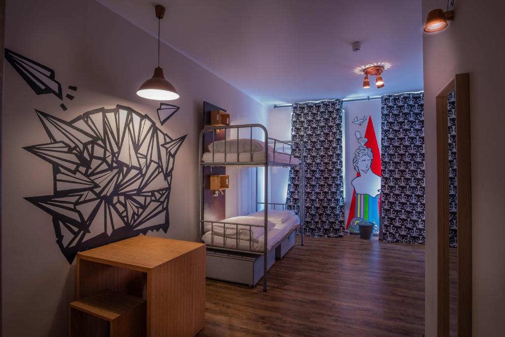 Postel nebo postele na pokoji v ubytování Sunflower Hostel Berlin