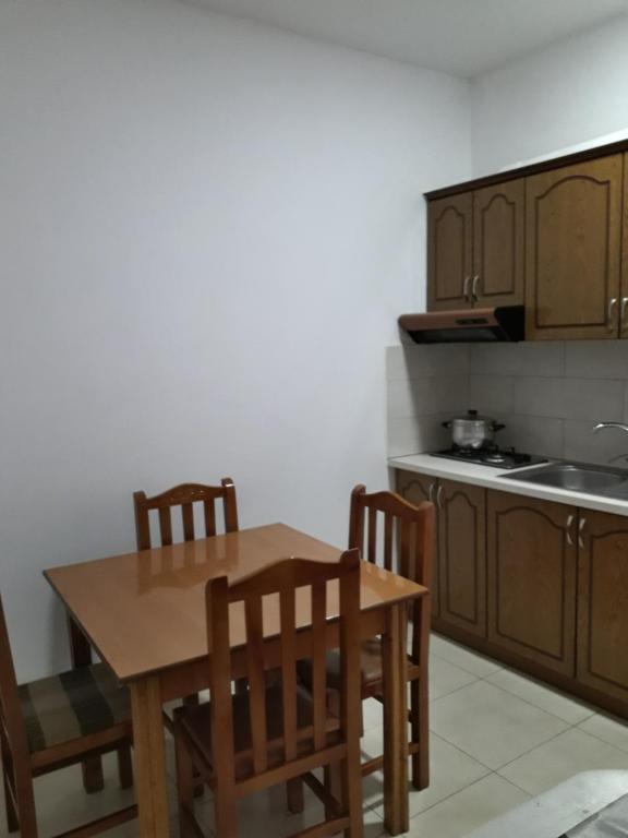 Kuchyň nebo kuchyňský kout v ubytování Rooms and Apartments Analipsi