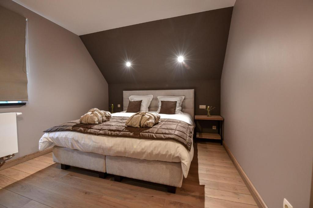 Postel nebo postele na pokoji v ubytování B&B De Waeterhoeve