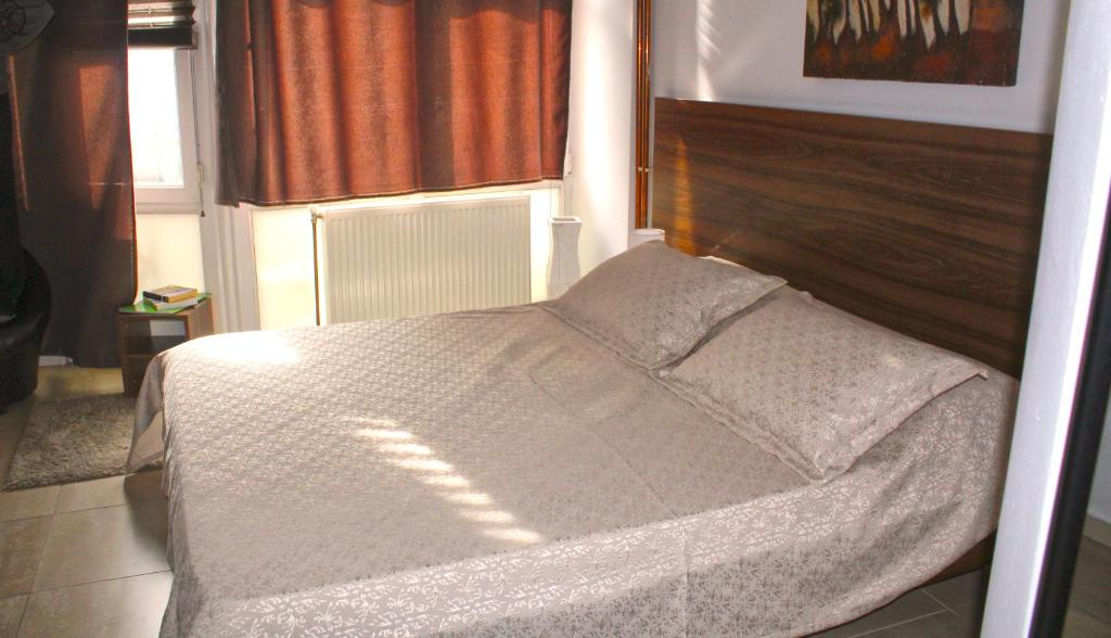 Postel nebo postele na pokoji v ubytování Hotel Kika