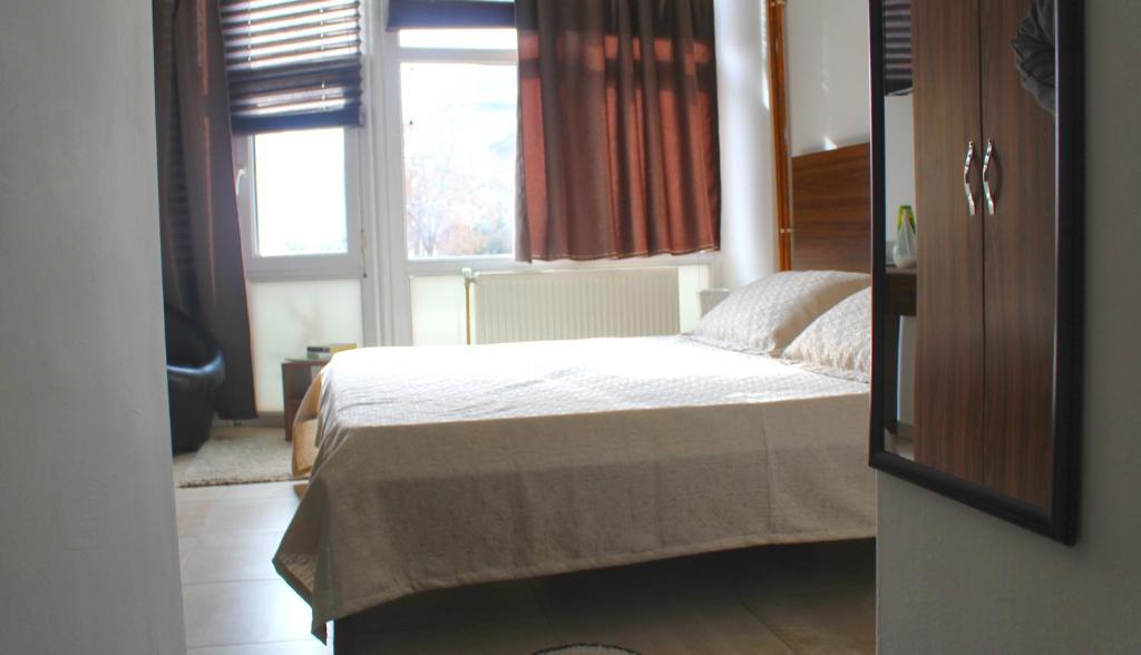 Postel nebo postele na pokoji v ubytování Hotel Kika