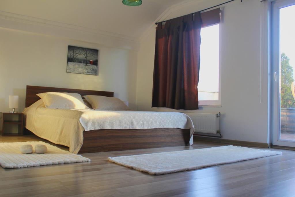 Postel nebo postele na pokoji v ubytování Hotel Kika
