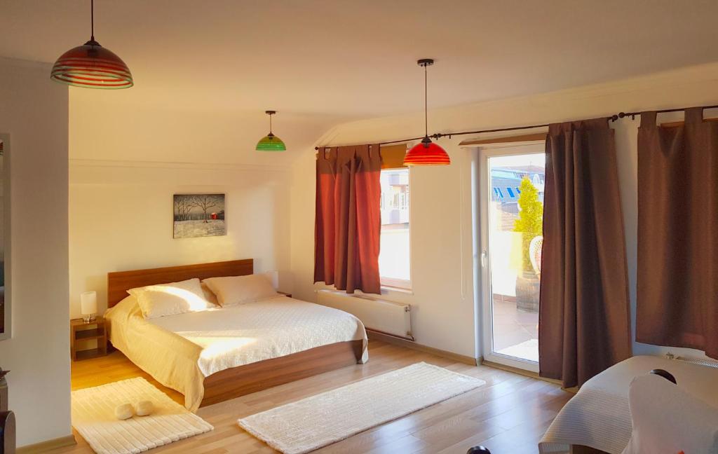 Postel nebo postele na pokoji v ubytování Hotel Kika
