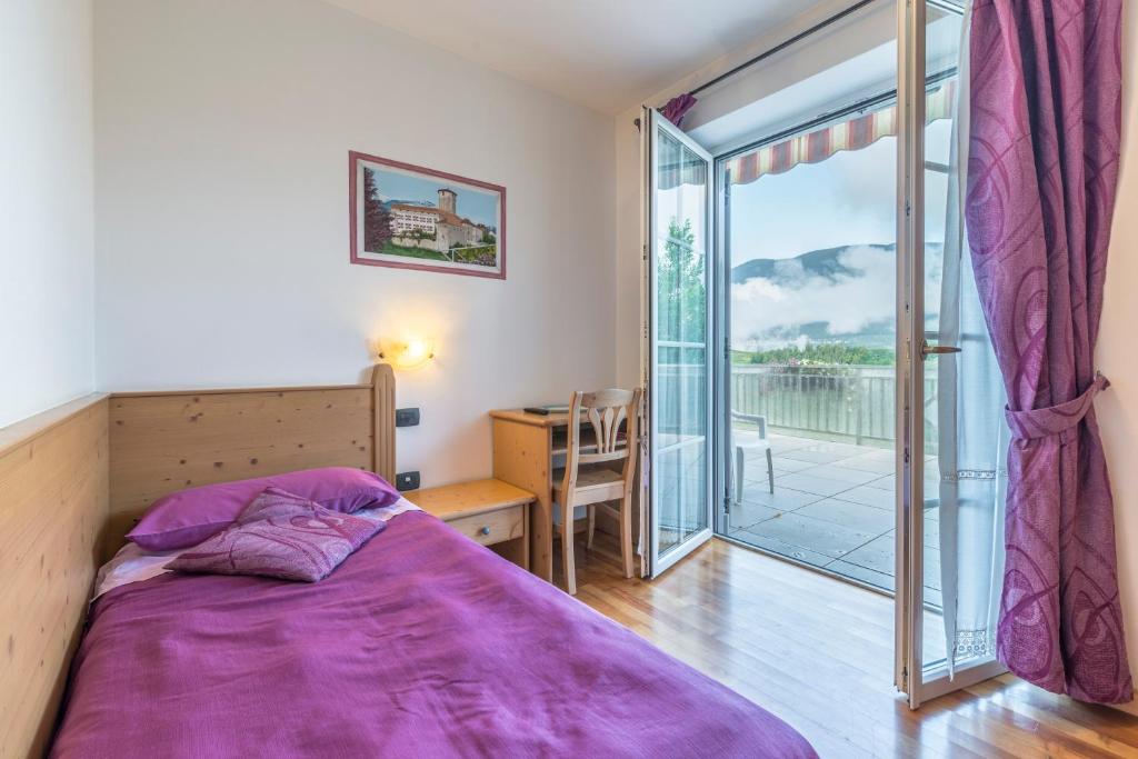 Postel nebo postele na pokoji v ubytování Agritur Casamela