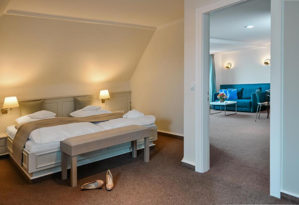 Postel nebo postele na pokoji v ubytování Hotel Rungholt