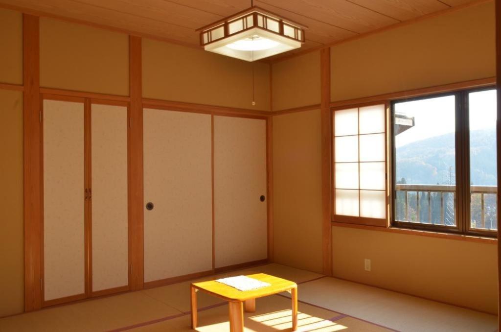 a room with a table and a window at Myoko - Hotel / Vacation STAY 24124 in Myoko