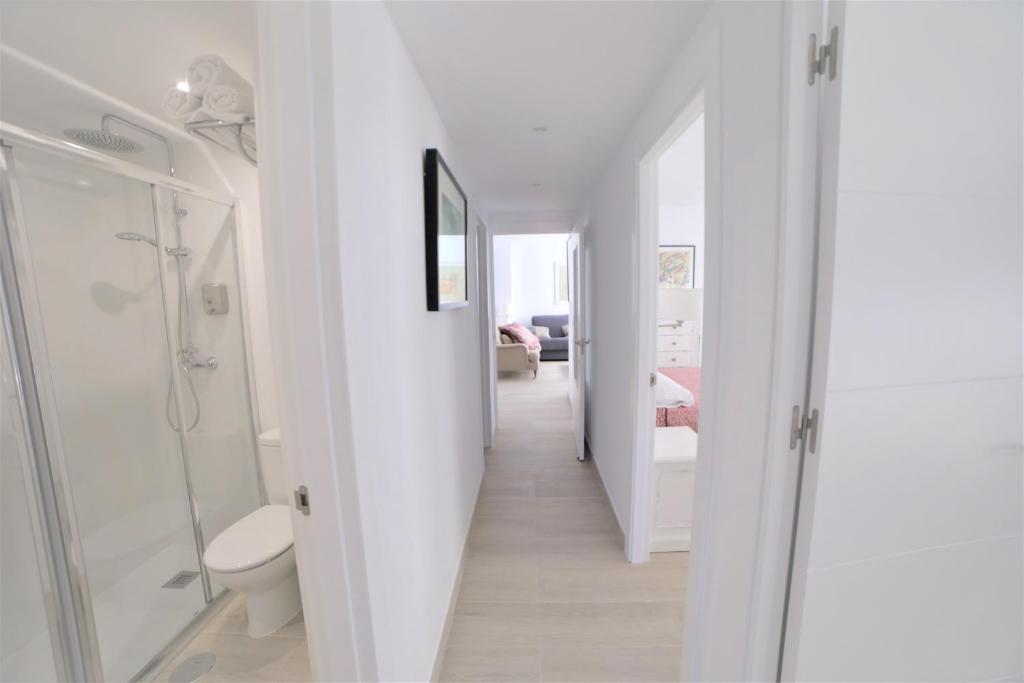 Posteľ alebo postele v izbe v ubytovaní APARTAMENTO RIALTO 2