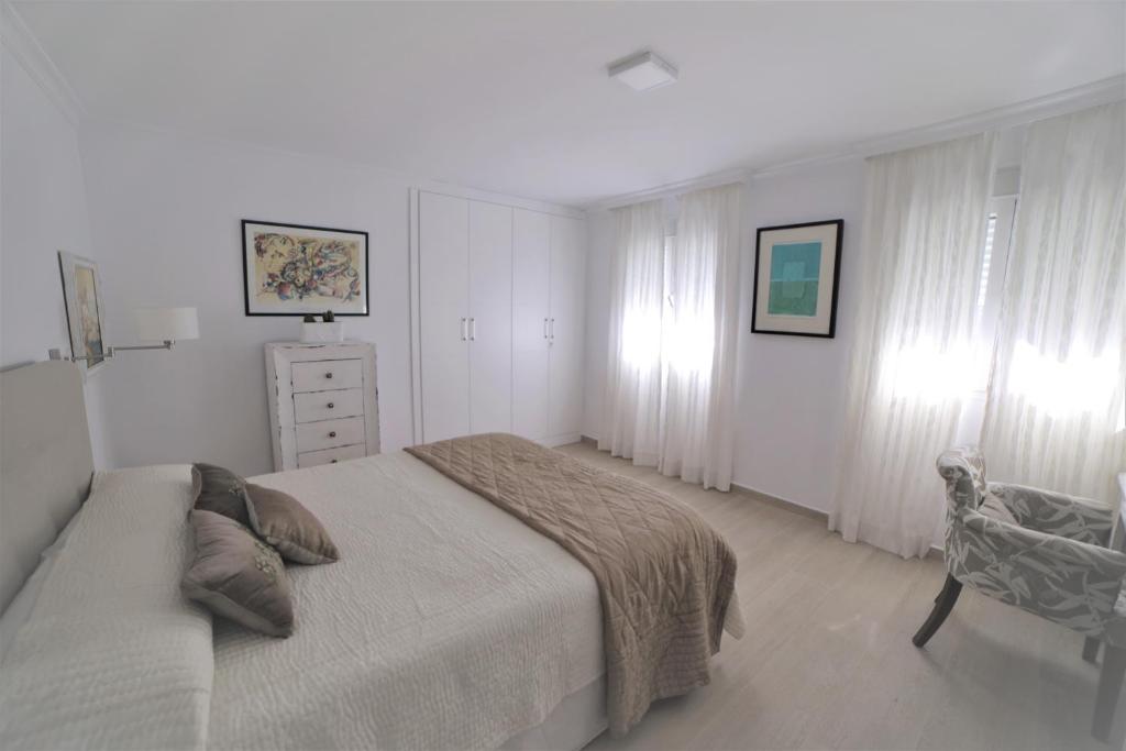Posteľ alebo postele v izbe v ubytovaní APARTAMENTO RIALTO 2