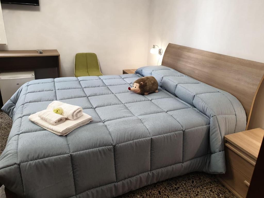 Postel nebo postele na pokoji v ubytování B&B La Dimora dei Professori