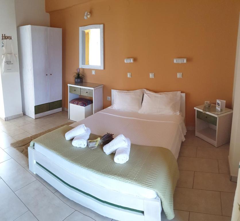 Postel nebo postele na pokoji v ubytování Epi Apartments