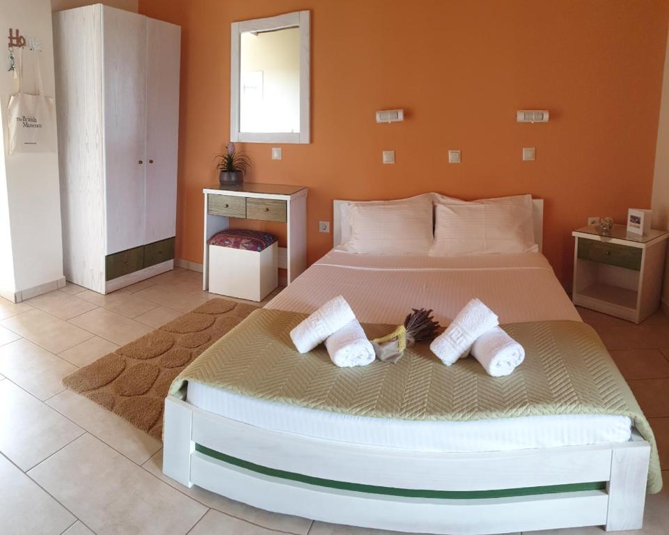 Postel nebo postele na pokoji v ubytování Epi Apartments