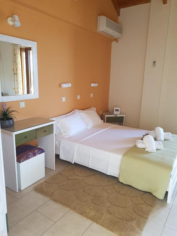 Postel nebo postele na pokoji v ubytování Epi Apartments