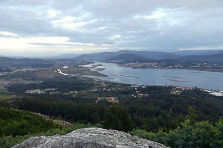 a view of a body of water from a mountain at La Guardia in A Guarda