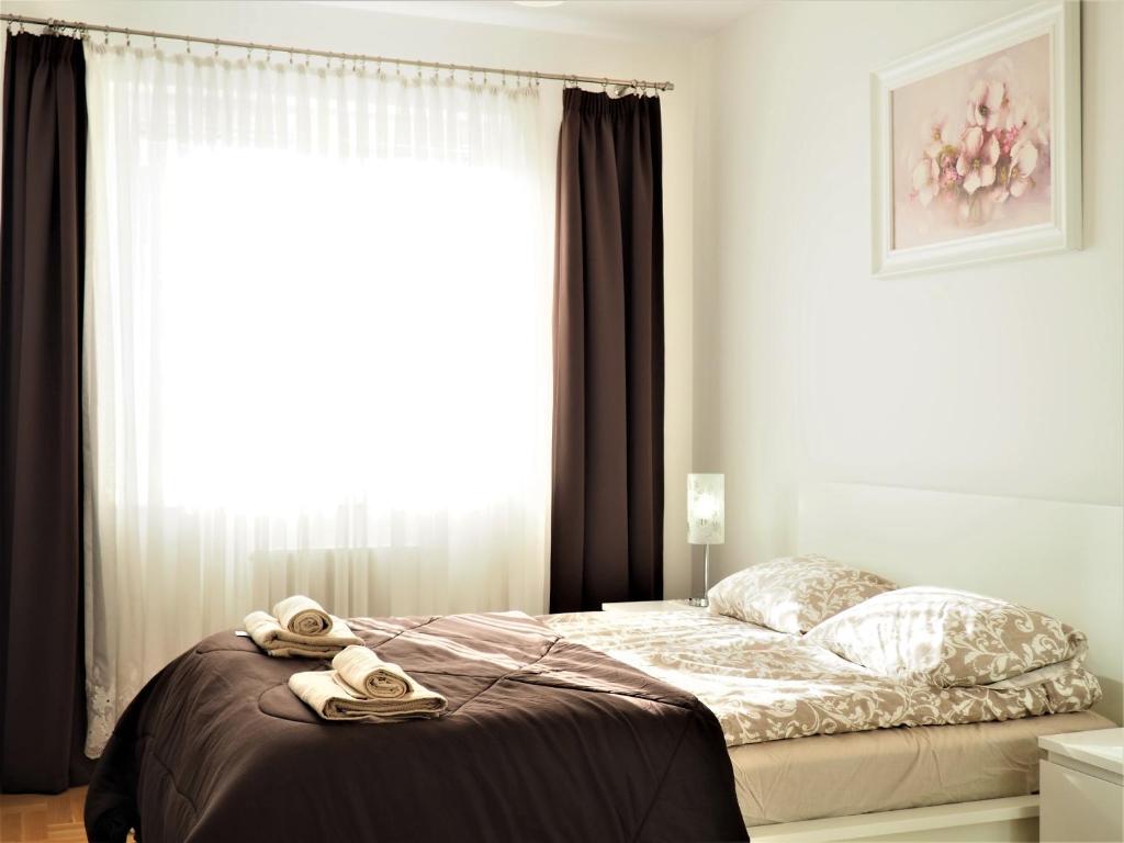 Posteľ alebo postele v izbe v ubytovaní Apartament 3 pokoje, parking, balkon - Gdańsk Centrum