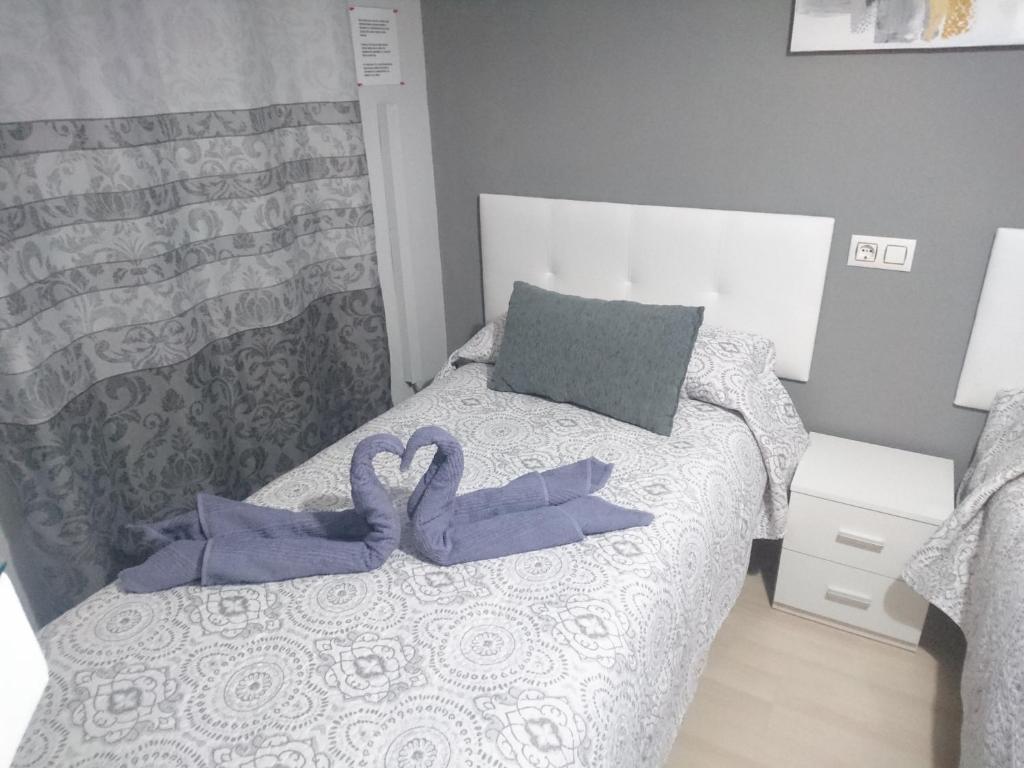Posteľ alebo postele v izbe v ubytovaní Apartamento con parking privado gratis incluido