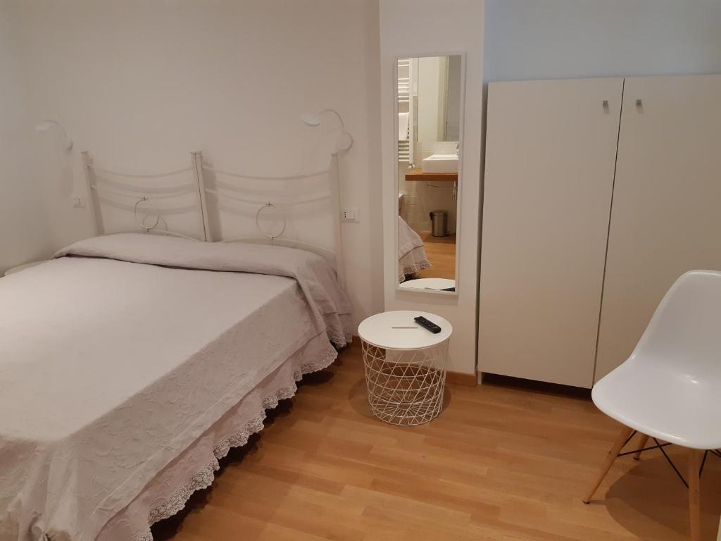 Ένα ή περισσότερα κρεβάτια σε δωμάτιο στο Casa Vacanze "Colle Bandiera"