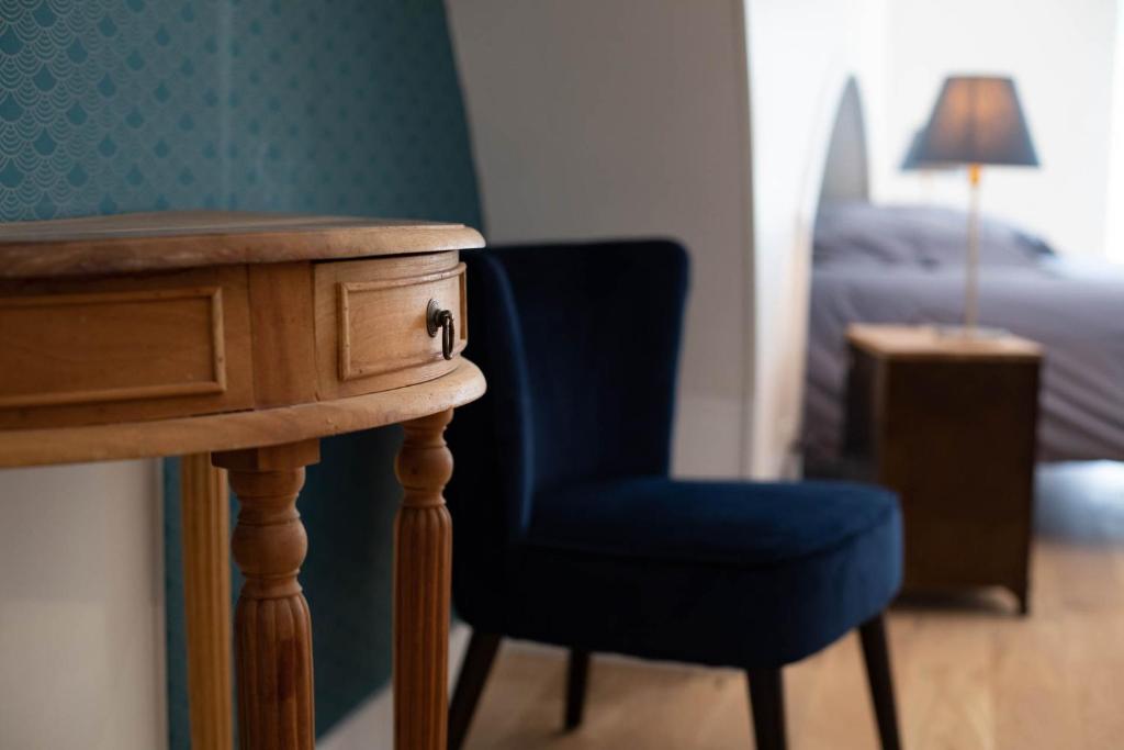 Posezení v ubytování Gîte Le Pressoir