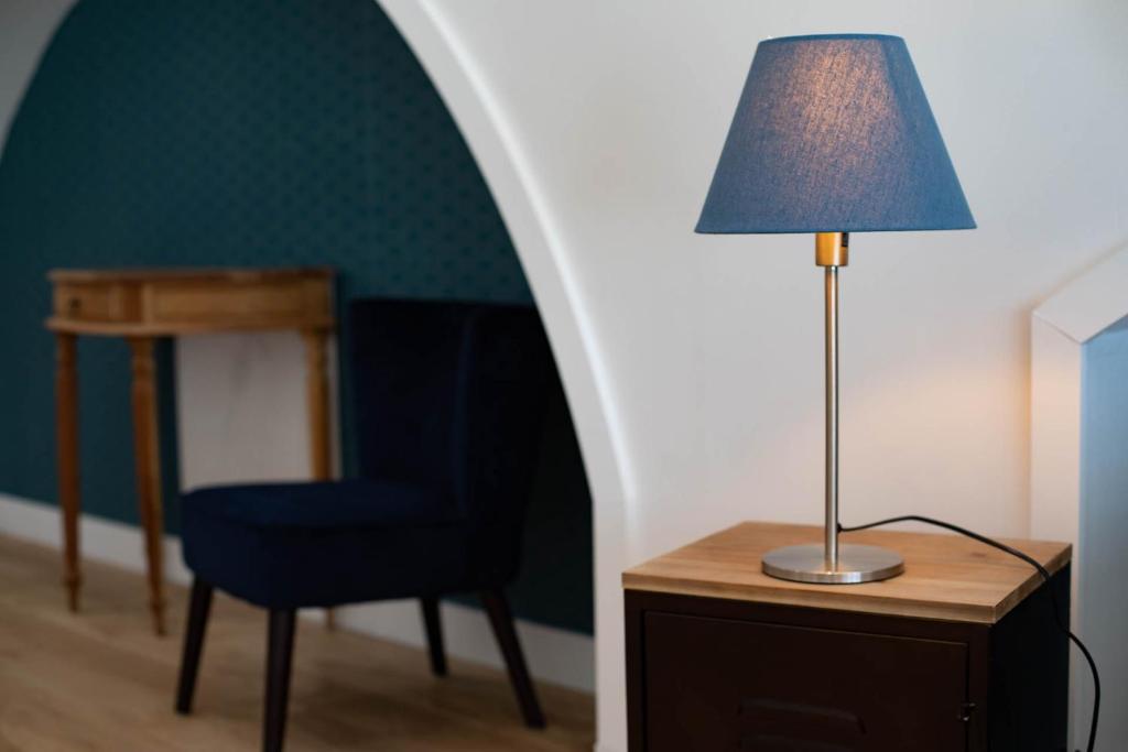 Postel nebo postele na pokoji v ubytování Gîte Le Pressoir