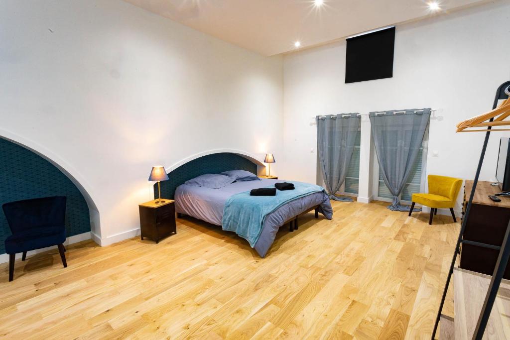 Postel nebo postele na pokoji v ubytování Gîte Le Pressoir
