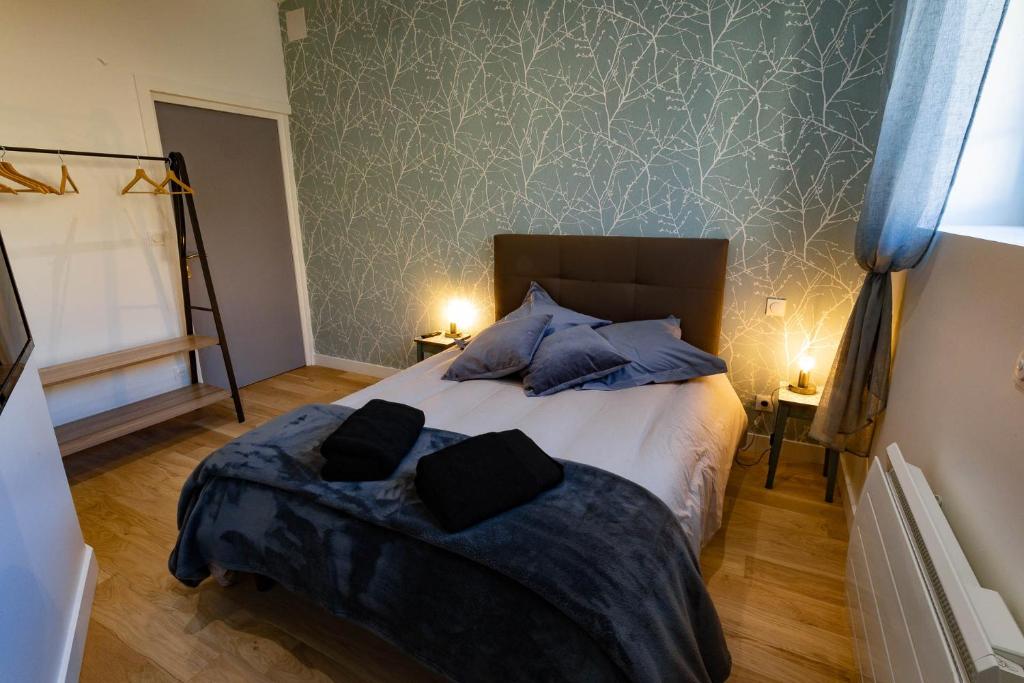 Postel nebo postele na pokoji v ubytování Gîte Le Pressoir