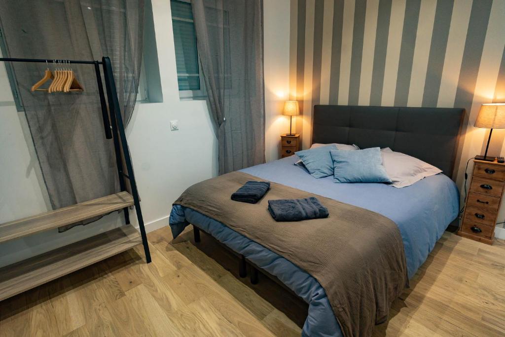 Postel nebo postele na pokoji v ubytování Gîte Le Pressoir