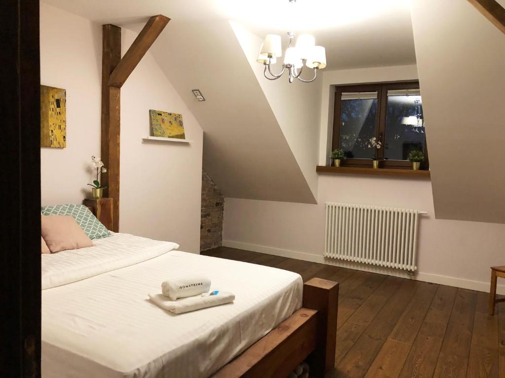 Posteľ alebo postele v izbe v ubytovaní Bednarska 18 - Loft by Homeprime