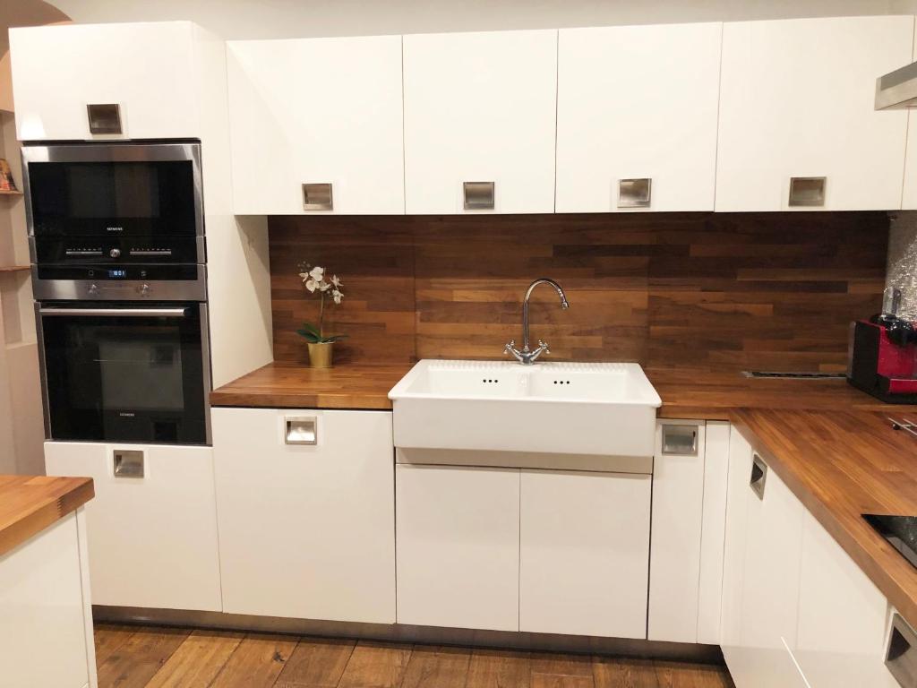Kuchyňa alebo kuchynka v ubytovaní Bednarska 18 - Loft by Homeprime