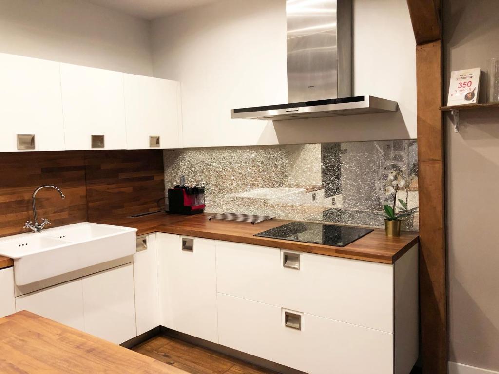 Kuchyňa alebo kuchynka v ubytovaní Bednarska 18 - Loft by Homeprime