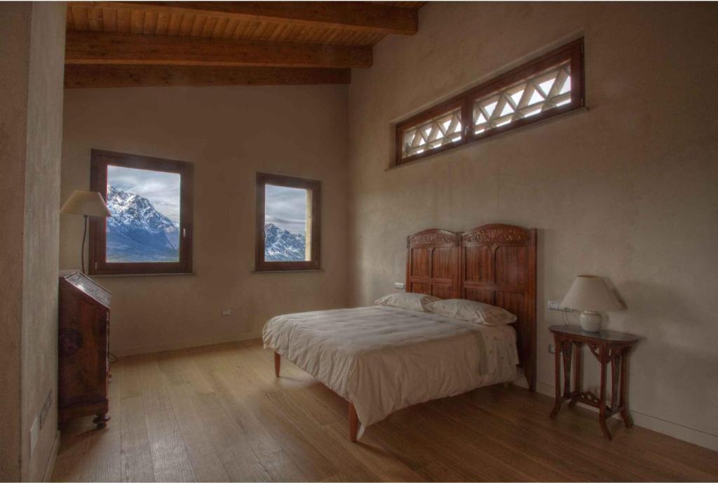 Tempat tidur dalam kamar di Agriturismo Cignale