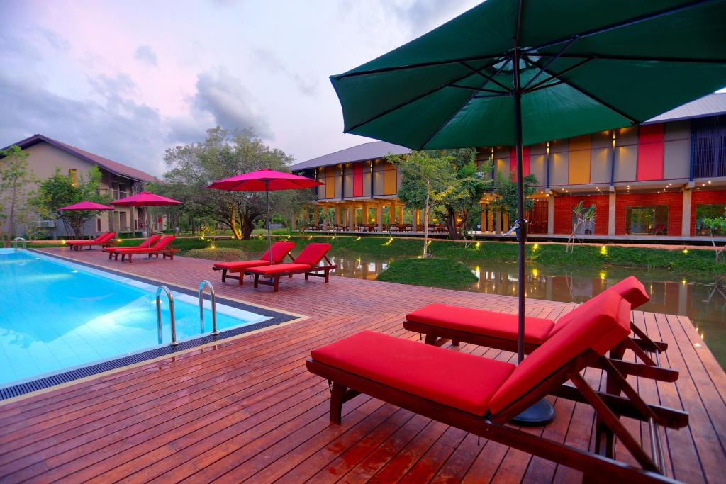 Bazén v ubytování Tropical Life Resort and Spa nebo v jeho okolí