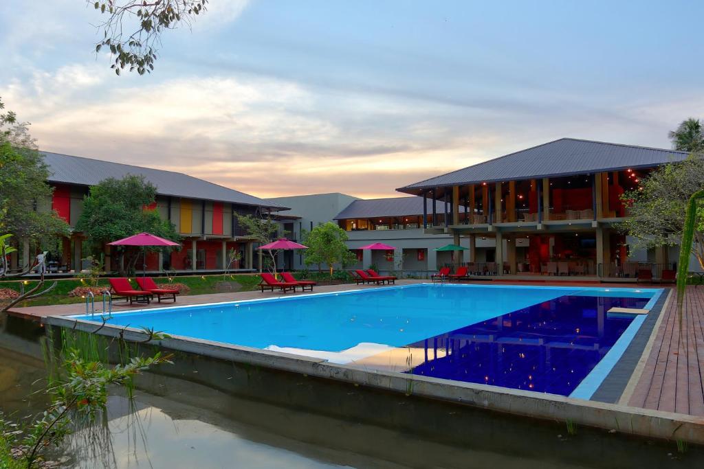 Bazén v ubytování Tropical Life Resort and Spa nebo v jeho okolí