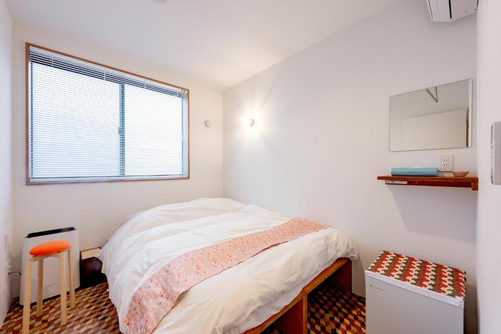 Postel nebo postele na pokoji v ubytování plat hostel keikyu asakusa karin