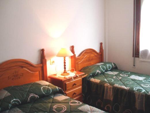Postel nebo postele na pokoji v ubytování Casa Herrero