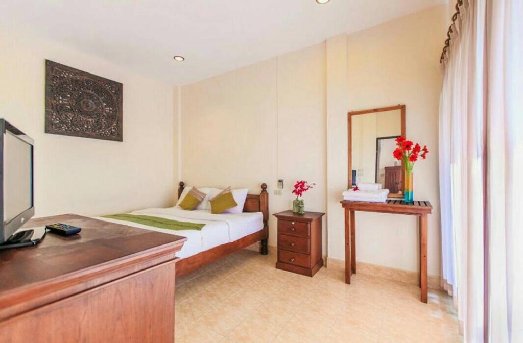 Postel nebo postele na pokoji v ubytování Meewaya Hotel