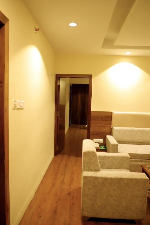 Posezení v ubytování Sai Neem Tree Hotel