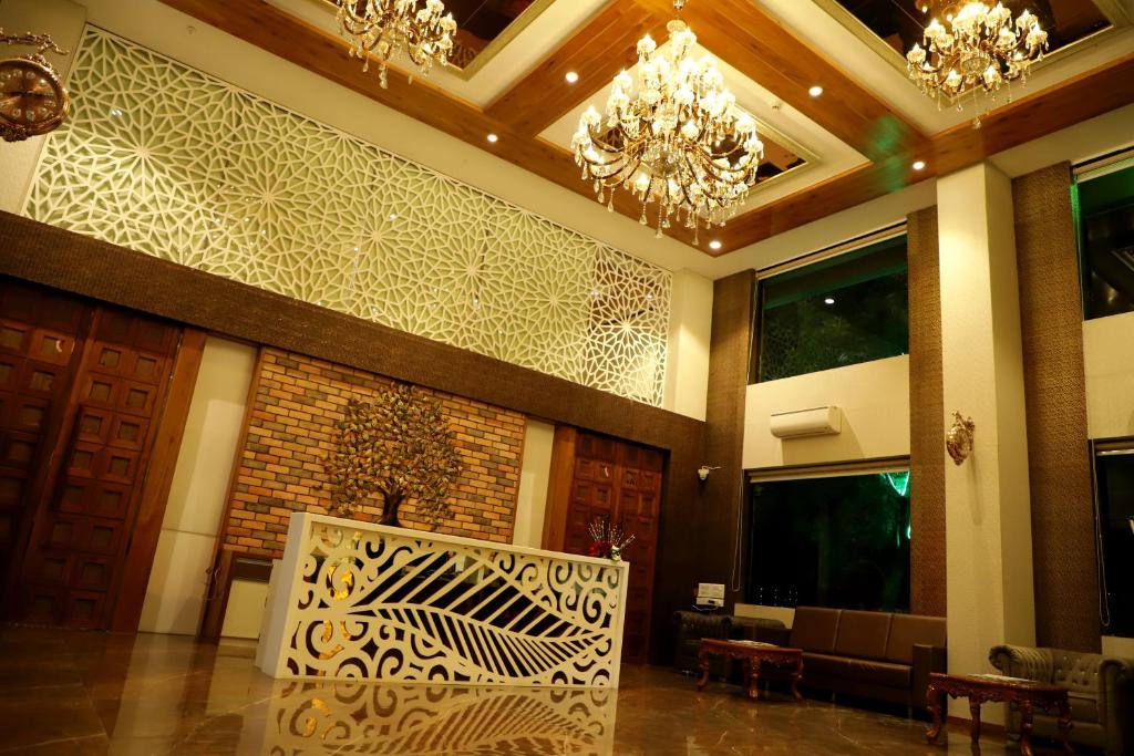 Posezení v ubytování Sai Neem Tree Hotel
