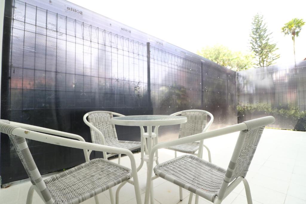 Patio nebo venkovní prostory v ubytování Diyar Villas Puncak F4/8