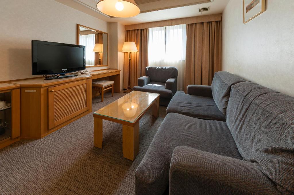 TV a/nebo společenská místnost v ubytování Hotel Siena