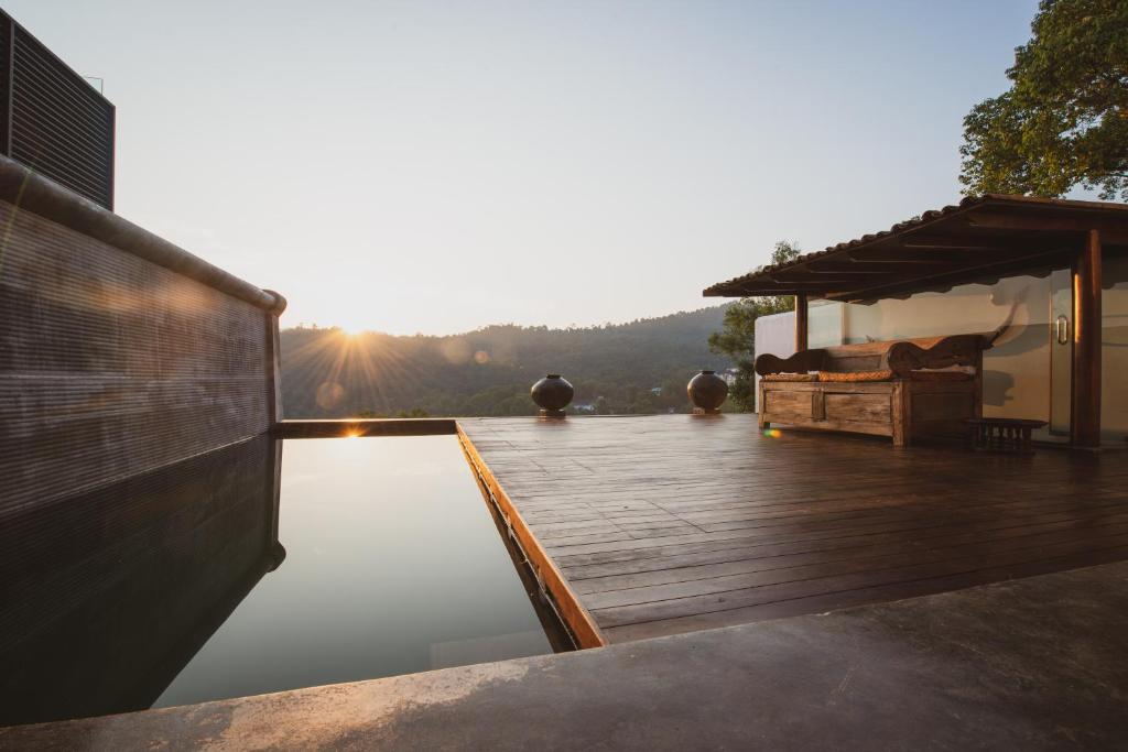 a house with a pool on a deck at The Townhouse - By Samadhi in Kuala Lumpur