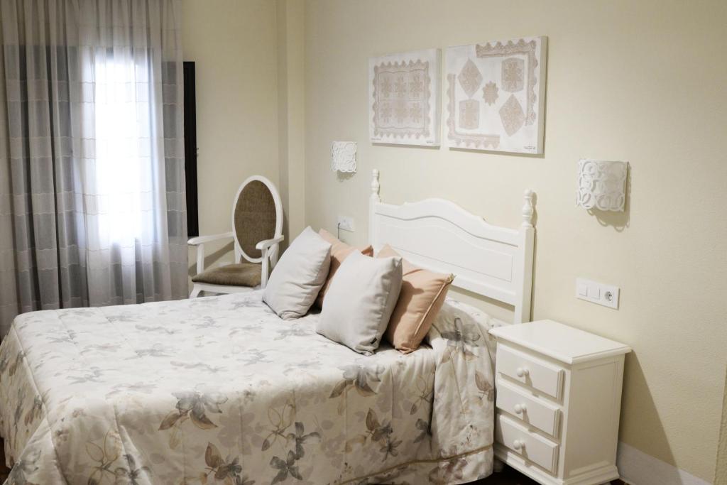 Cama o camas de una habitación en Hotel Zuhayra