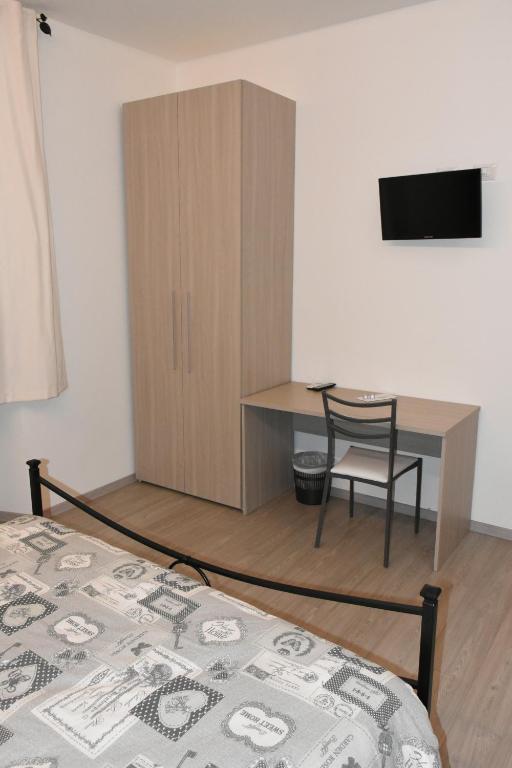 Postel nebo postele na pokoji v ubytování Albano Station Rooms