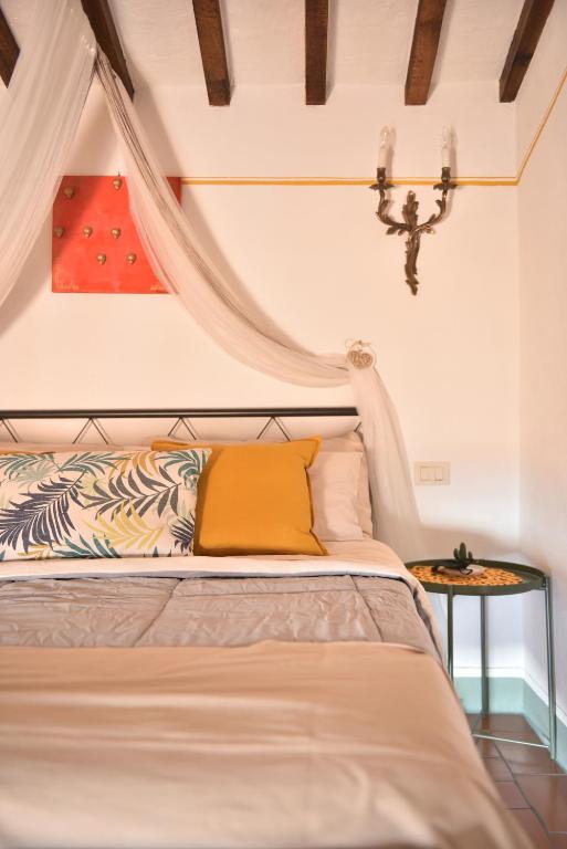 Postel nebo postele na pokoji v ubytování Il Giglio B&B