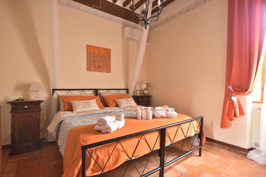 Postel nebo postele na pokoji v ubytování Il Giglio B&B