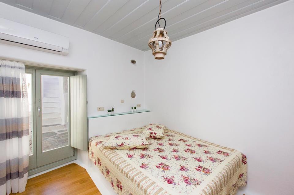 Postel nebo postele na pokoji v ubytování Aegean White Home