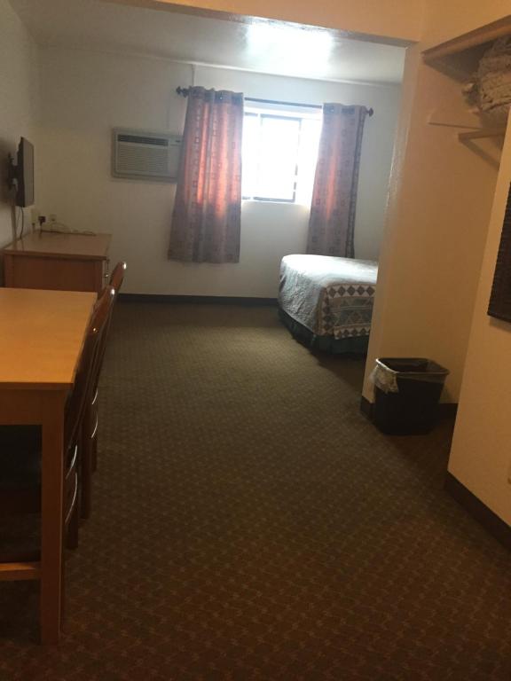 Postel nebo postele na pokoji v ubytování Motel express